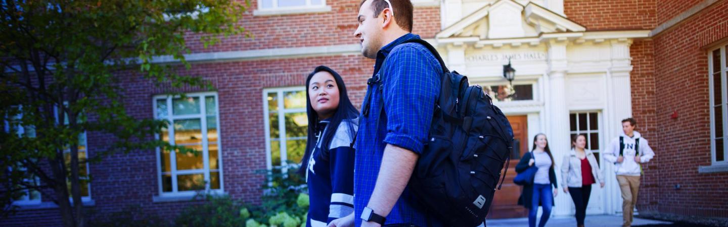 Students walking to class in fall