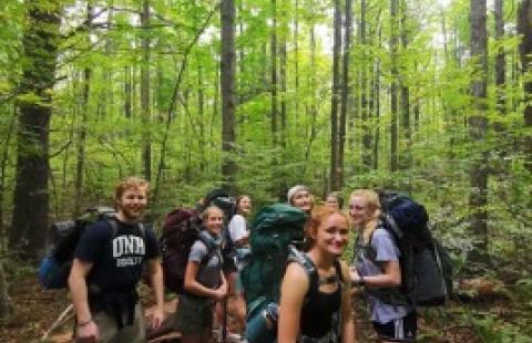 UNH students backpacking 
