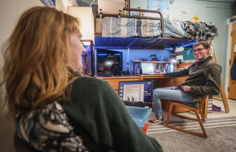 UNH students in residence hall room