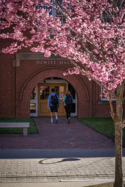 Hewitt Hall entryway and students