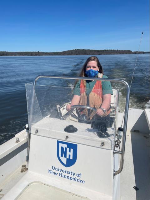 UNH student on boat