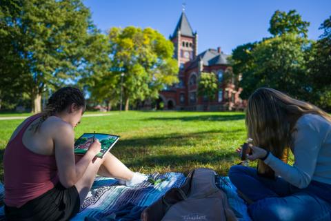 UNH students drawing on T Hall lawn