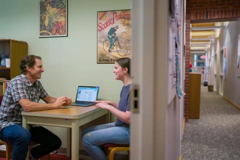 UNH student meeting with professor