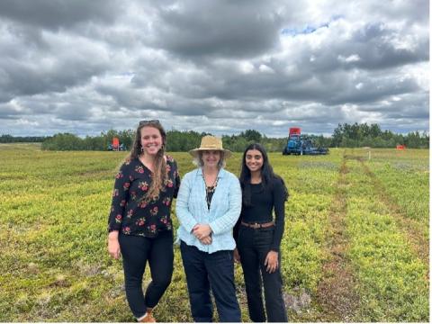 UNH student at Wyman's Farm