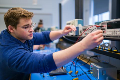 Student working in electrical and computer engineering lab
