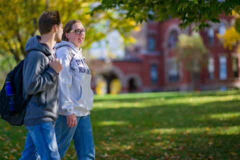 UNH students walking on campus