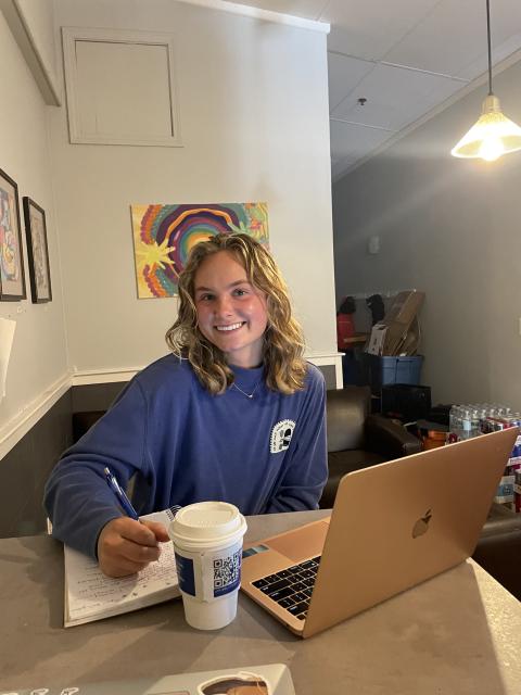 Caroline studying at Breaking New Grounds in downtown Durham