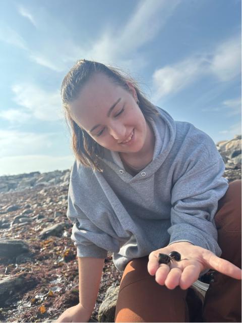 My roommate, Noelle, holding wild hermit crabs for the first time