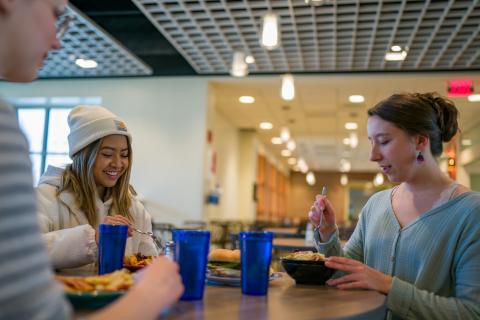 UNH students eating in dining hall
