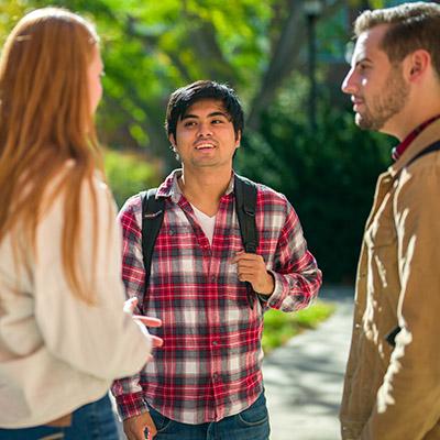 Students conversing on the street