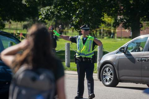 UNH police officer directing traffic 