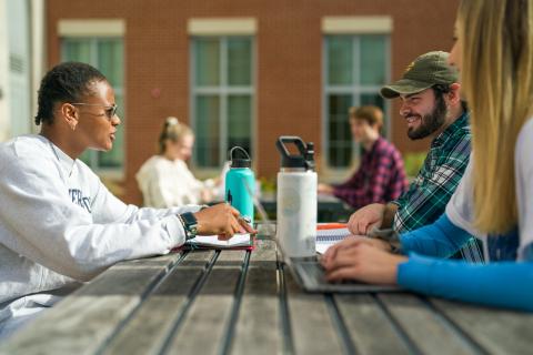 UNH students studying outside