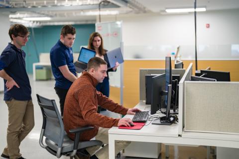 UNH students working in the InterOperability Laboratory