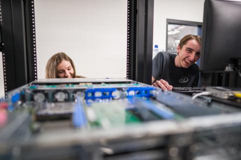 UNH students working in the InterOperability Laboratory 