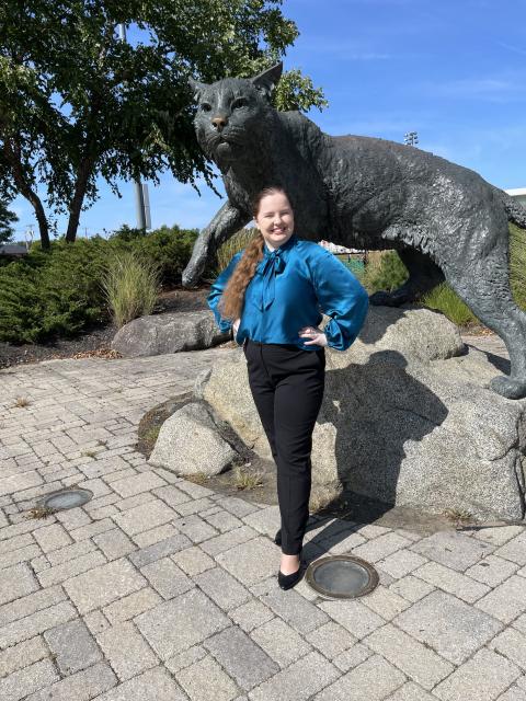 Amelia with the UNH Wildcat statue 