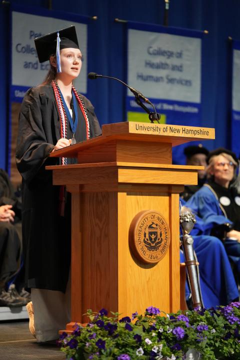Emma speaking at commencement