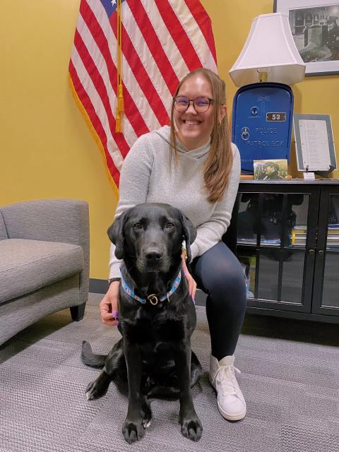 Skylar at the Manchester Police Department working alongside comfort dog, Patch.
