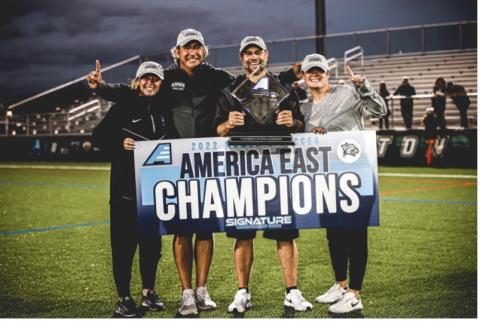 The Women's Soccer coaching staff and I after we won the America East Tournament in 2022. 