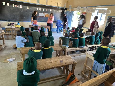 UNH students teaching in classroom in Kenya, supported by the International Changemaker Grant 