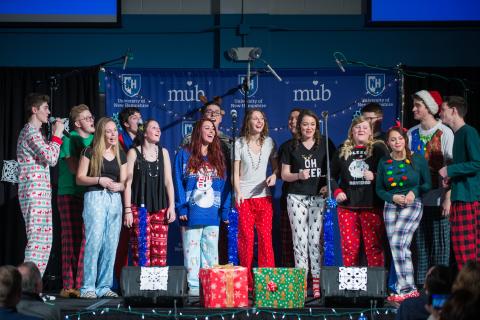 UNH Alabaster Blue A cappella group performing holiday concert