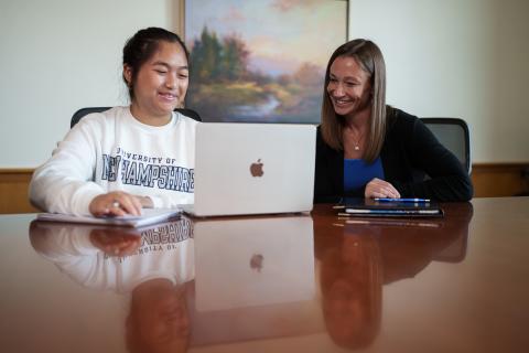 UNH professor meeting with student