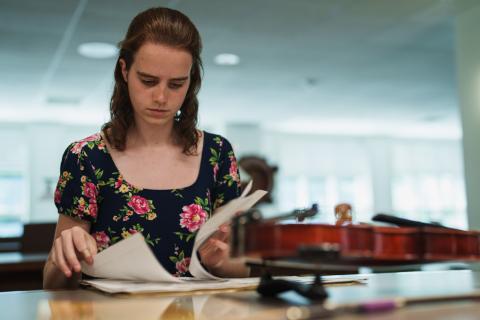 UNH music student researching tunes and dances in the New England contra dance world
