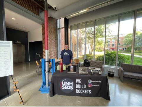 Anthony Bilodeau '26 tabling for UNH SEDS during CEPS Fall Open House 2024.