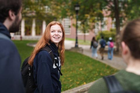 UNH students walking on campus