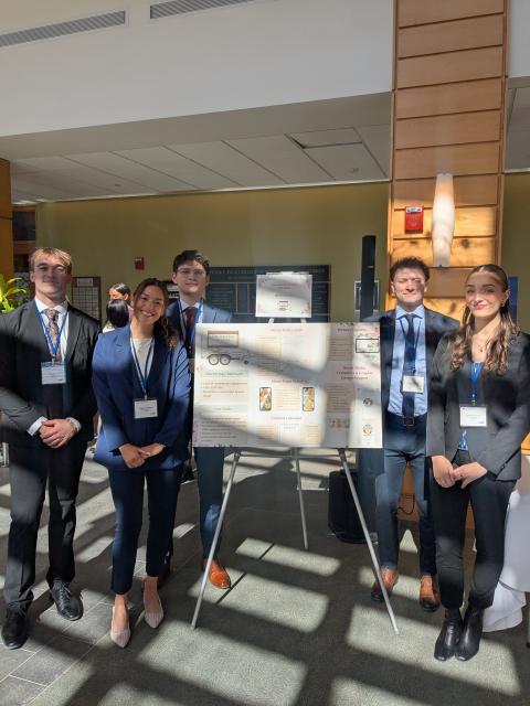 My team and I with our poster for the Real World Business Challenge