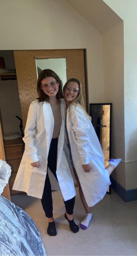 UNH students in lab coats