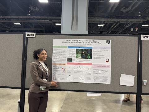 UNH student presenting poster