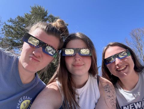 Me watching the eclipse on T-Hall lawn with friends