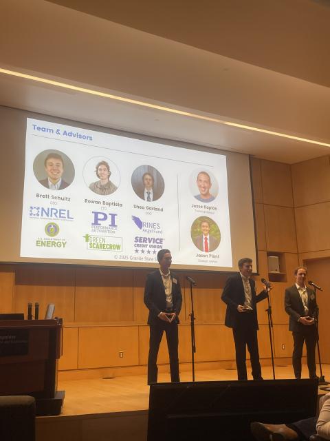 UNH students presenting on stage