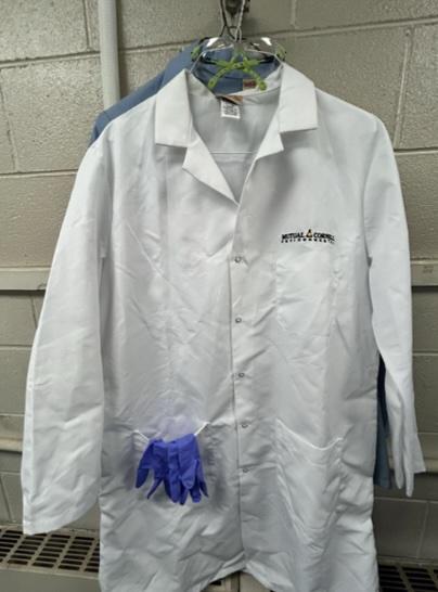 Mutual Cornell Environmental lab coat, goggles, and gloves