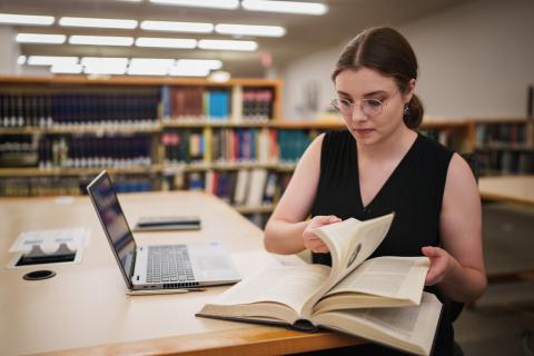 UNH student studying in Dimond Library