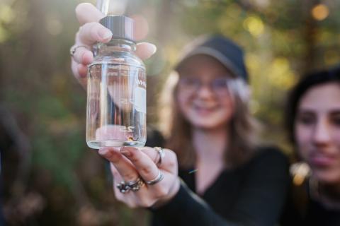 UNH student doing coursework in the field 