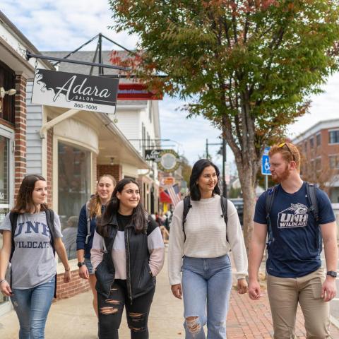 UNH students walking in downtown Durham