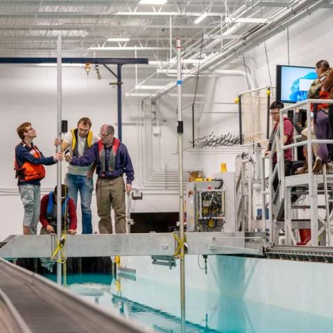 UNH students and professor in ocean engineering lab