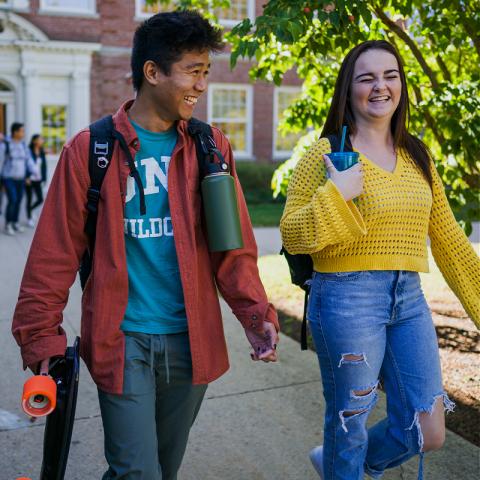 UNH students walking on campus